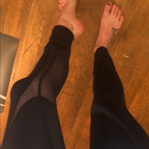 Lululemon size 4 leggings with mesh panelling